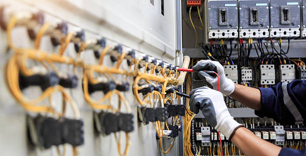 Professional Electrician technician working in Brighton, CO